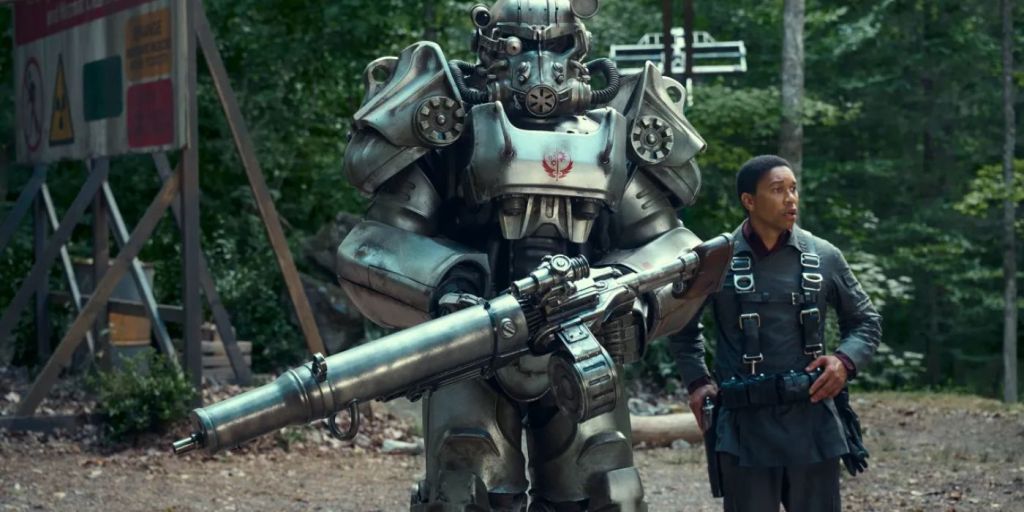 Aaron Clifton Moten as Maximus next to a power armour soldier in Prime Video's Fallout